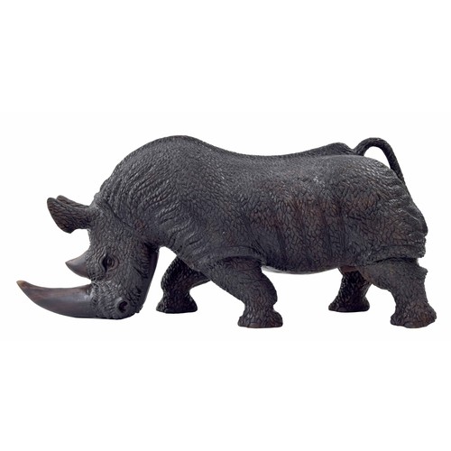 658 - Large solid carved wood sculpture of a rhinoceros, 27