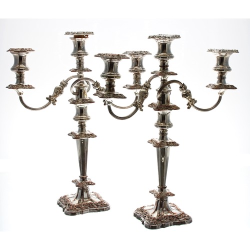 604 - Pair of Sheffield plate three branch candelabra, 18