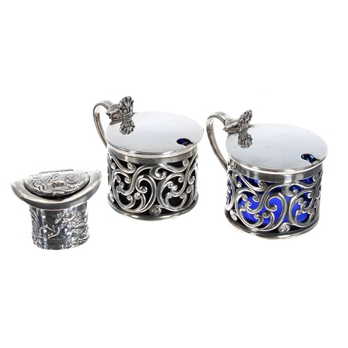 597 - Matched pair of William Hutton & Sons Ltd. silver openwork mustard pots, with hinged covers encl... 