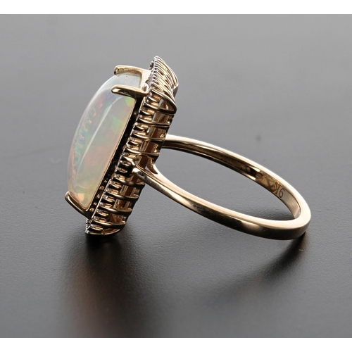 171 - Attractive modern 9ct yellow gold opal and diamond ring, the cabouchon opal in a surround of baguett... 