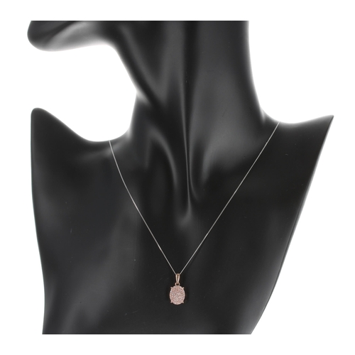 296 - Modern 9ct pink diamond pendant on a 9ct white gold slender necklace, 1.5gm, the pendant 18mm... 