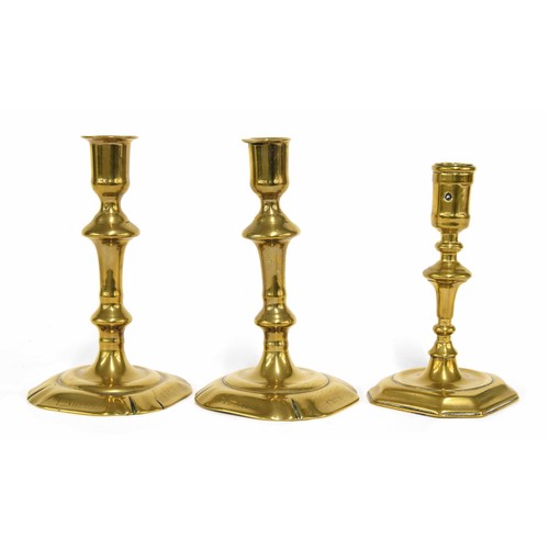 651 - Pair of Georgian brass candlesticks, on canted square bases inscribed 'E. Snell 1763', 6.5