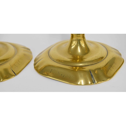 651 - Pair of Georgian brass candlesticks, on canted square bases inscribed 'E. Snell 1763', 6.5