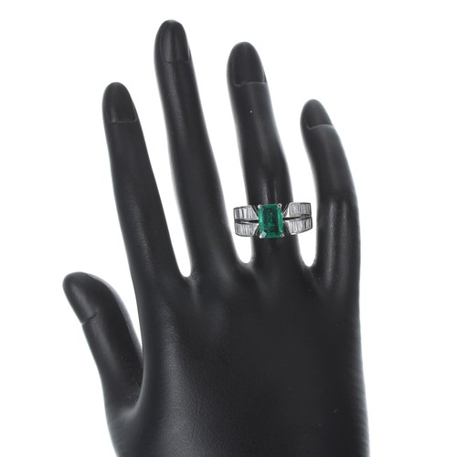 131 - Impressive 18ct white gold emerald and diamond ring, the emerald 1.70ct approx, with split shoulders... 