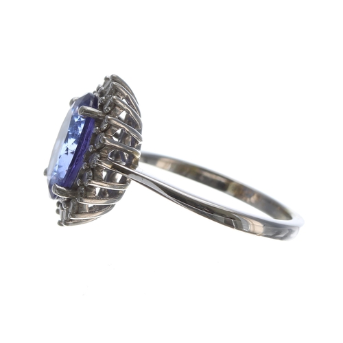 252 - Iliana 18ct white gold tanzanite and diamond oval cluster ring, the AAA tanzanite 3.80ct approx, in ... 