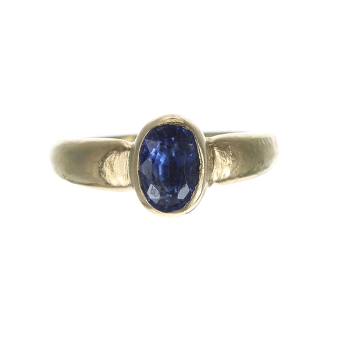 281 - High carat yellow gold backed sapphire single stone ring, rub-over set with an oval sapphire, 1.25ct... 