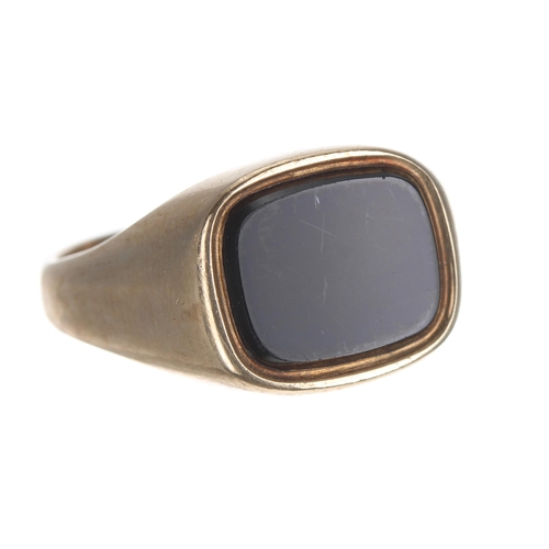 306 - 9ct black onyx mounted gentleman's ring, width 13mm, 6.1gm, ring size U/V; also a rose gold bloodsto... 