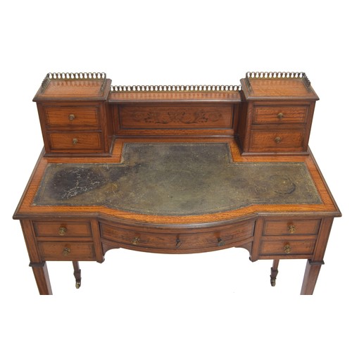 955 - Good Edwardian satinwood and boxwood inlaid desk, the raised gallery back with inlaid foliate scroll... 