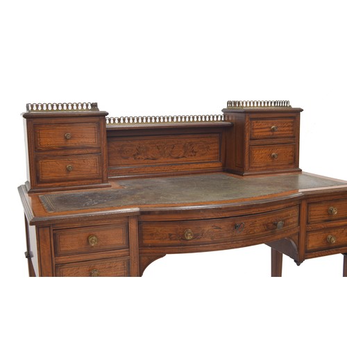 955 - Good Edwardian satinwood and boxwood inlaid desk, the raised gallery back with inlaid foliate scroll... 