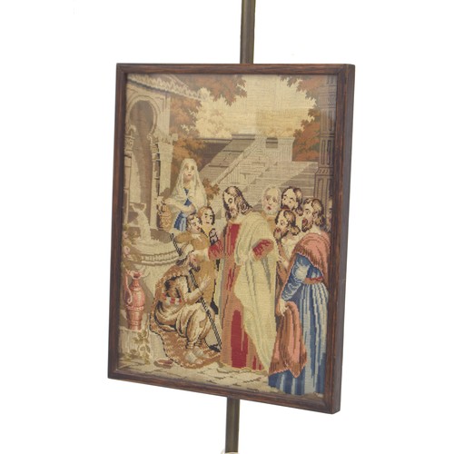 956 - Victorian rosewood framed tapestry fire screen, on a brass pole mounted upon turned mahogany base, t... 