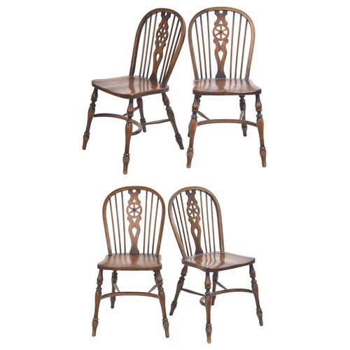 957 - Set of four elm seat wheel back Windsor dining chairs, 17