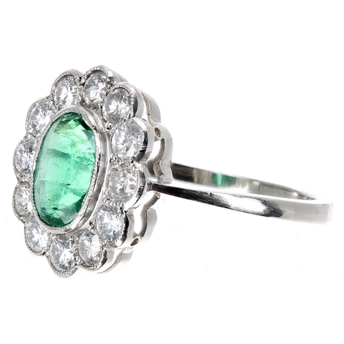 150 - Fancy emerald and diamond platinum oval cluster ring, the emerald 1.10ct approx, in a surround of ro... 