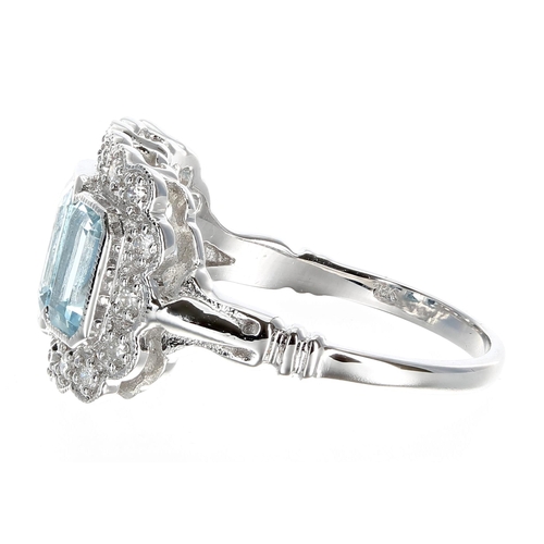 240 - Attractive 18ct white gold aquamarine and diamond ring, set with three aquamarines surrounded by dia... 