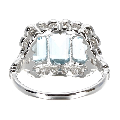 240 - Attractive 18ct white gold aquamarine and diamond ring, set with three aquamarines surrounded by dia... 