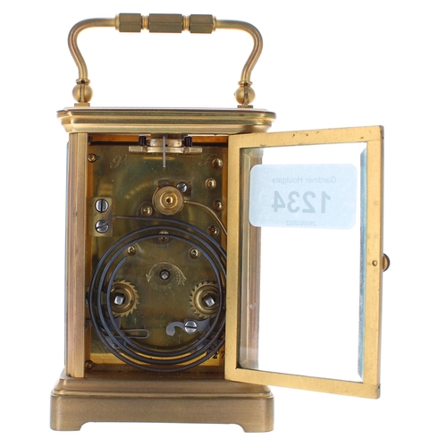 1234 - Carriage clock striking on a gong, within a corniche gilded brass case, 6.25