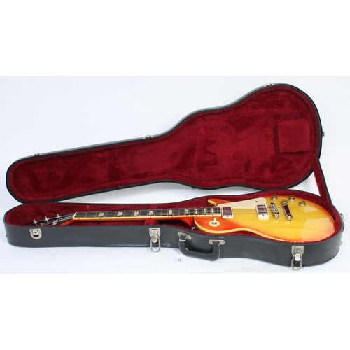 150 - 1977 Gibson Les Paul Deluxe electric guitar, made in USA, ser. no. 7xxxxx7; Body: cherry sunburst fi... 