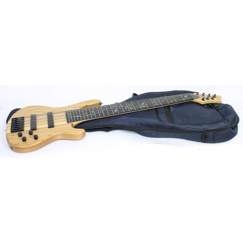 176 - Wolf seven string bass guitar; Body: natural spalted finish, a few minor dings to sides; Neck: maple... 