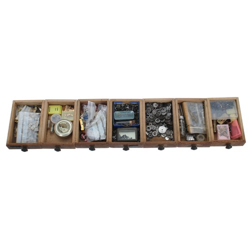 529 - Twenty one drawer wooden chest containing a quantity of watch parts to include fusee chain, hands, b... 