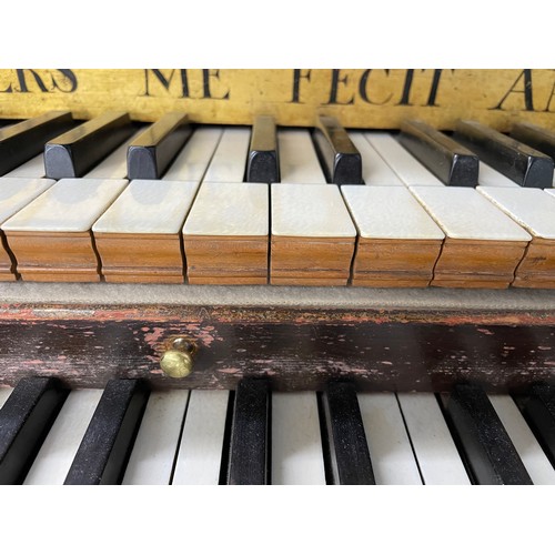 1555 - A two-manual harpsichord by Andreas Ruckers, Antwerp, 1614, the mahogany case with boxwood stringing... 