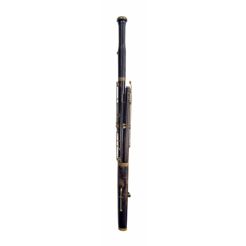 1811 - A fourteen-keyed stained fruitwood bassoon by Gautrot aîné, Paris, third quarter 19th century, brass... 