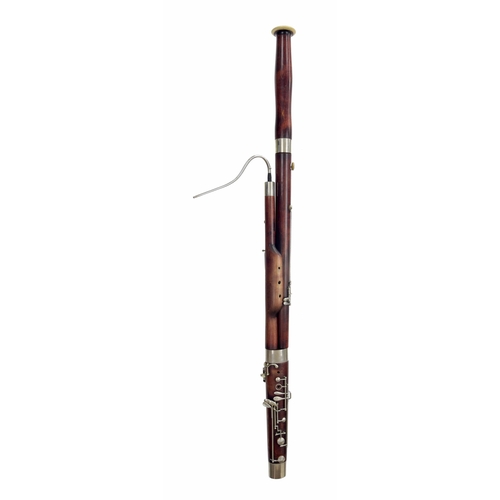 1815 - Eighteen-keyed stained wooden bassoon stamped D. McCullough, Dublin and bearing the Schultzmarke (fo... 