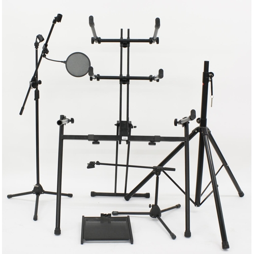 3088 - Selection of stands to include a Quiklok three tier keyboard stand, two microphone boom stands (one ... 