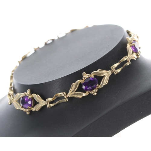 134 - 9ct amethyst bracelet with safety chain, 4.8gm, 7