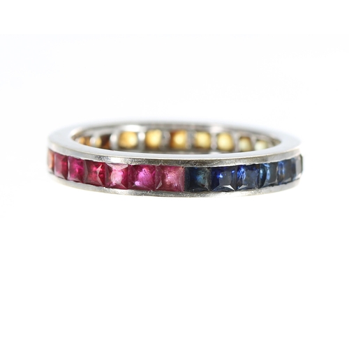 157 - 14ct white gold gem set full eternity ring, with ruby, sapphire, garnet and peridot, width 4mm, 3.1g... 