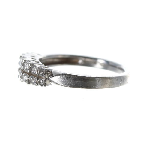 163 - Modern platinum two row diamond half-hoop ring, with fourteen graduated round brilliant-cut diamonds... 