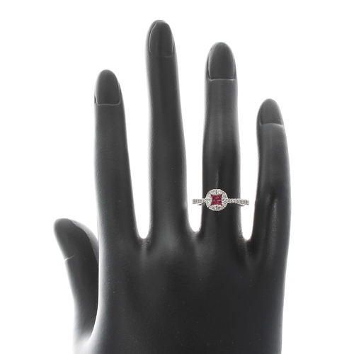 164 - Attractive modern 18ct white gold ruby and diamond cluster ring, with diamond set shoulders and four... 