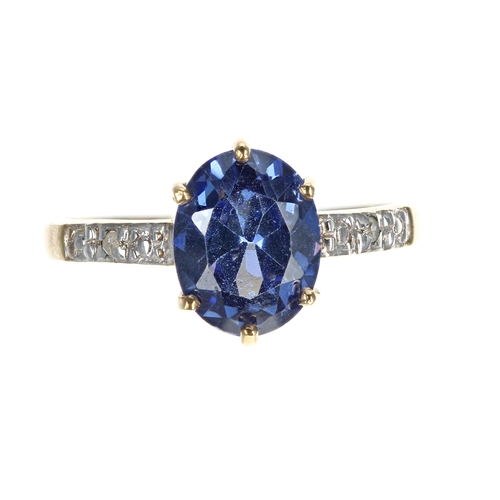 238 - 9ct blue zircon ring with diamond set shoulders, width 10mm, 1.9gm, ring size O