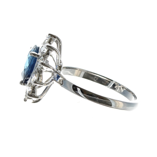 245 - Impressive 18ct white gold sapphire and diamond pear shaped cluster ring, with a pear-cut sapphire 2... 