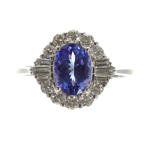 262 - Attractive 18ct white gold tanzanite and diamond cluster ring, the tanzanite 1.32ct approx, the diam... 