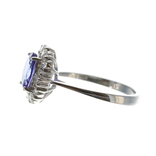 262 - Attractive 18ct white gold tanzanite and diamond cluster ring, the tanzanite 1.32ct approx, the diam... 