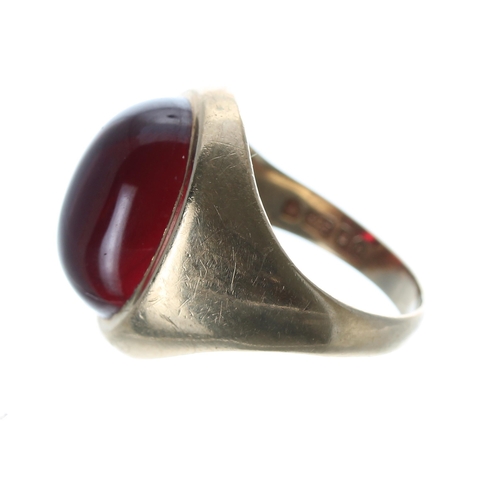 273 - 9ct yellow cabouchon garnet gentleman's ring, London 1977, width 18mm, 6.5gm, ring size L... 