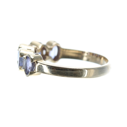 152 - Tanzanite and diamond half-hoop yellow gold ring, 6mm, 3.7gm, ring size O/P