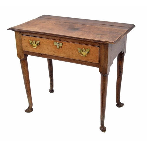 862 - Georgian oak lowboy, the moulded top over a single long drawer, raised on circular tapering legs and... 