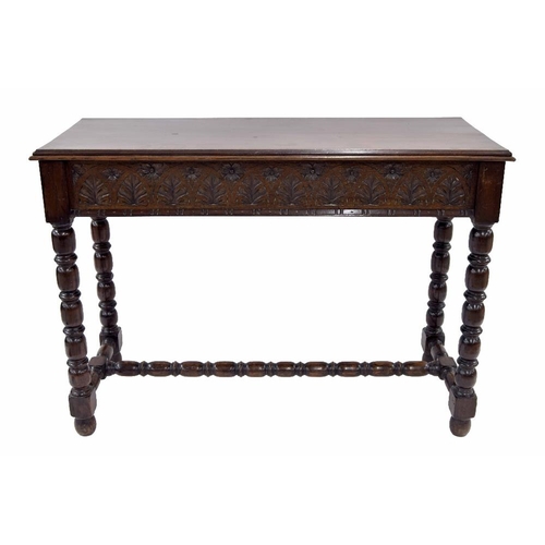 887 - Antique carved oak serving or hall side table, with a moulded mahogany top over carved oak frieze ra... 