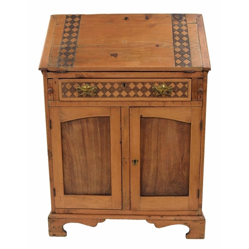 877 - Arts & Crafts style pine bureau, the fall front with carved chequered board banding enclosing fi... 