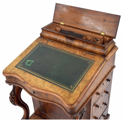 883 - Victorian figured walnut davenport, with raised back and hinged cover enclosing a fitted stationery ... 