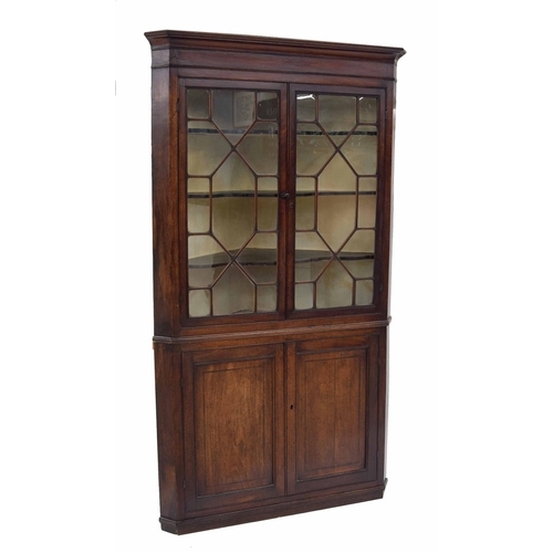 918 - Large Georgian mahogany standing corner cabinet, the moulded cornice over two astragal glazed doors ... 