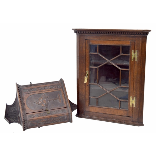 925 - Georgian oak hanging corner cabinet, with key cornice over a single astragal glazed door enclosing a... 