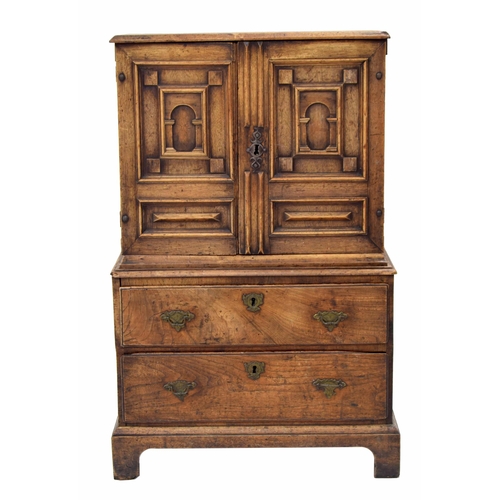 880 - Interesting Continental chest on stand of small proportion, the moulded top over two carved panelled... 