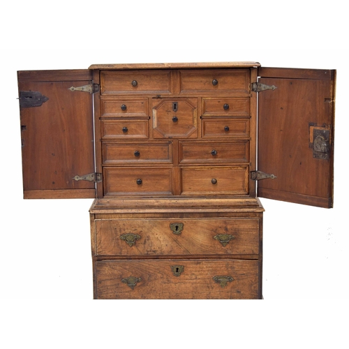 880 - Interesting Continental chest on stand of small proportion, the moulded top over two carved panelled... 