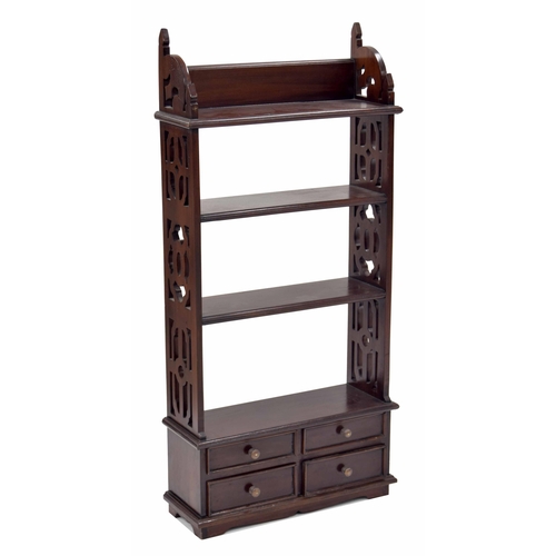 909 - Set of open shelves in the manner of Chippendale, with open shelves and pierced sides over four shor... 