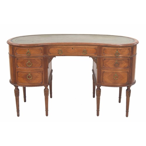 930 - Good French style kidney shaped desk, the top with a green tooled green leather inset, over a centra... 