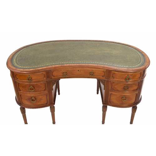 930 - Good French style kidney shaped desk, the top with a green tooled green leather inset, over a centra... 