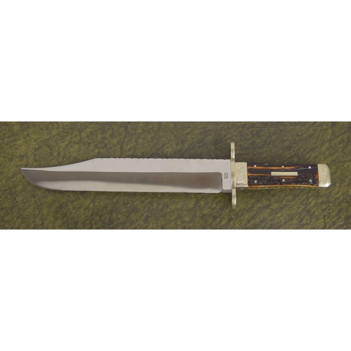 612 - Stan Shaw Bowie knife, with horn scales, engraved bolsters and worked blade back and handle edges, t... 