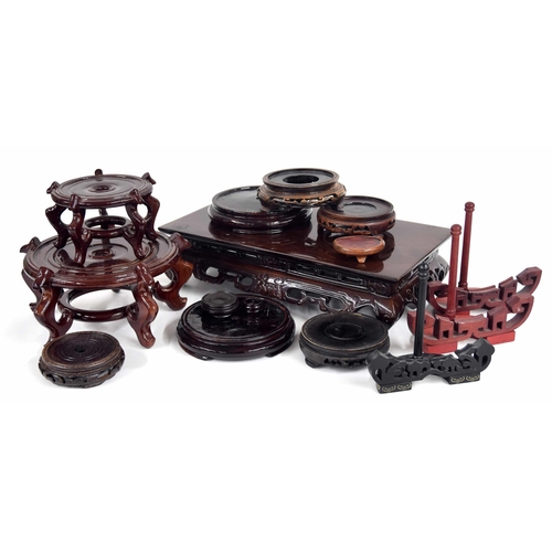 691 - Selection of assorted Chinese hardwood plate/pot stands, the largest rectangular example 15.75