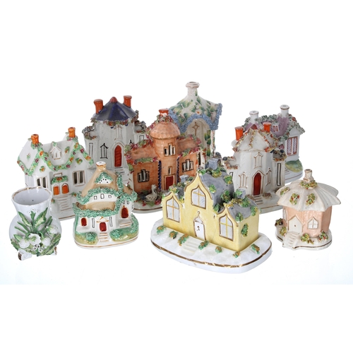 651 - Collections of Staffordshire pottery pastille burners, modelled as houses (9)